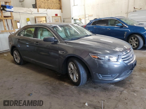 2015 Ford Taurus SEL with VIN 1FAHP2E84FG102318, listed as a Copart auction lot 61744685 with 82,149 mi miles and Salvage title. Bid and sale history available at DreamBid. Image 4.