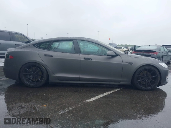 2013 Tesla Model S с VIN 5YJSA1DN4DFP09961, выставлен на аукционе IAAI как лот 42304508 с пробегом 90 648 миль миль и . История ставок и продаж доступна на DreamBid. Изображение 13.