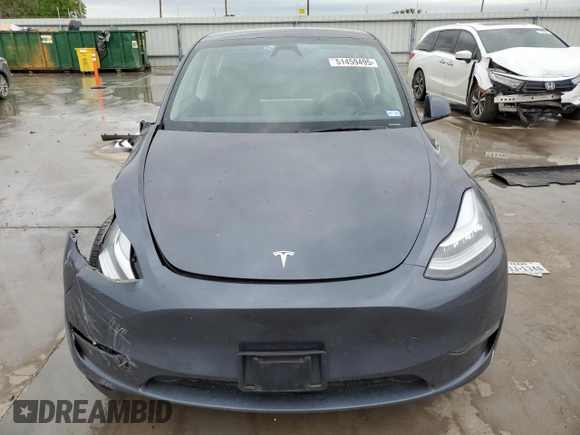 2023 Tesla Model Y Long Range with VIN 7SAYGDEE3PA151887, listed as a Copart auction lot 51459495 with 15,562 mi miles and Salvage Title. Bid and sale history available at DreamBid. Image 5.