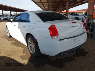 2017 Chrysler 300 300C with VIN 2C3CCAEG5HH566487, listed as a IAAI auction lot 41807634 with 129,334 mi miles. Bid and sale history available at carsss.com. Image 3.