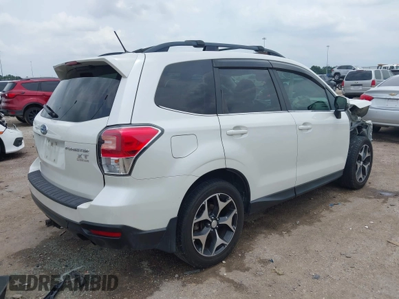 2014 Subaru Forester XT Touring with VIN JF2SJGMC4EH555465, listed as a IAAI auction lot 42357371 with 168,378 mi miles and . Bid and sale history available at DreamBid. Image 4.