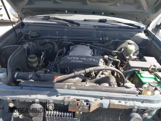 2003 Toyota Tundra SR5 with VIN 5TBBT44183S405902, listed as a IAAI auction lot 41704999 with 220,777 mi miles and . Bid and sale history available at DreamBid. Image 10.