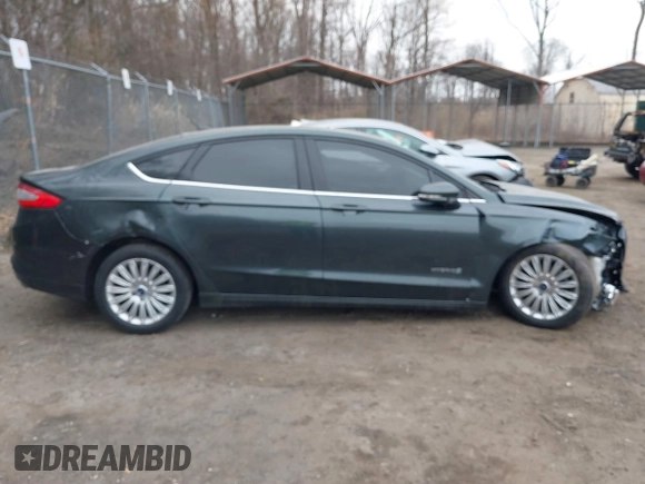 2015 Ford Fusion SE Hybrid with VIN 3FA6P0LU0FR242452, listed as a IAAI auction lot 41790218 with 163,741 mi miles. Bid and sale history available at carsss.com. Image 13.