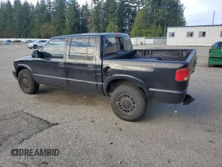 2001 GMC Sonoma SLS with VIN 1GTDT13W61K168519, listed as a Copart auction lot 50601565 with 0 mi miles and Salvage Title. Bid and sale history available at carsss.com. Image 2.