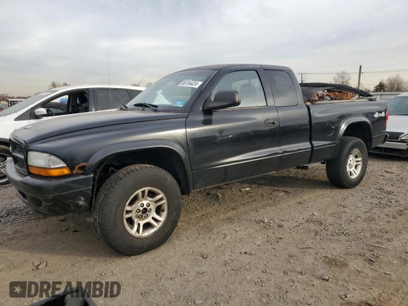 2003 Dodge Dakota с VIN 1D7HG32X93S273172, выставлен на аукционе Copart как лот 80704424 с пробегом 141 409 миль миль и Списание • Salvage title. История ставок и продаж доступна на DreamBid. Изображение 1.