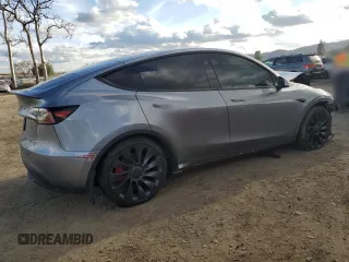 2024 Tesla Model Y Performance with VIN 7SAYGDEF2RF113873, listed as a Copart auction lot 46181915 with 19,625 mi miles and Salvage Title. Bid and sale history available at DreamBid. Image 3.