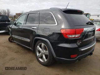 2011 Jeep Grand Cherokee Overland with VIN 1J4RR6GT9BC660730, listed as a Copart auction lot 53770745 with 106,351 mi miles and Salvage title. Bid and sale history available at DreamBid. Image 2.