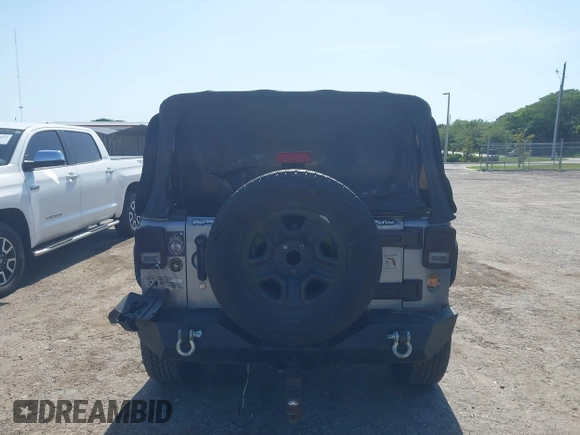 2014 Jeep Wrangler Sport with VIN 1C4AJWAG0EL126459, listed as a IAAI auction lot 42286803 with 179,025 mi miles and . Bid and sale history available at DreamBid. Image 16.
