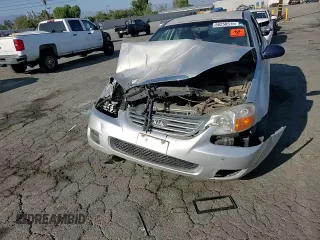 2008 Kia Spectra EX with VIN KNAFE122485540611, listed as a Copart auction lot 56258515 with 197,475 mi miles and Salvage title. Bid and sale history available at DreamBid. Image 13.