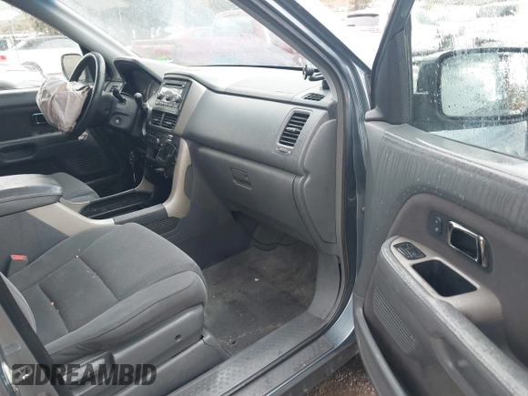 2007 Honda Pilot EX with VIN 2HKYF18437H528868, listed as a IAAI auction lot 41762030 with 203,212 mi miles. Bid and sale history available at carsss.com. Image 5.