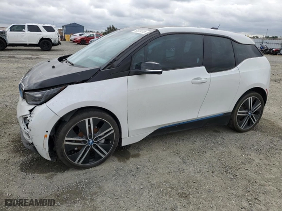 2017 BMW i3 with VIN WBY1Z8C38HV892042, listed as a Copart auction lot 52039315 with 73,573 mi miles and Salvage Title. Bid and sale history available at carsss.com. Image 1.