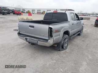 2014 Toyota Tacoma PreRunner with VIN 5TFJU4GN7EX058283, listed as a IAAI auction lot 41797328 with 101,811 mi miles. Bid and sale history available at carsss.com. Image 4.