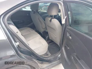 2013 Chevrolet Sonic LS with VIN 1G1JA5SH4D4138164, listed as a IAAI auction lot 42677319 with 144,244 mi miles and . Bid and sale history available at DreamBid. Image 8.