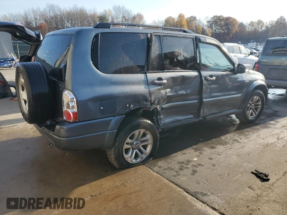 2004 Suzuki XL7 LX z VIN JS3TX92V544113643, wystawiony jako Copart lot #77832874 z przebiegiem Nie podano mil oraz Szkoda całkowita • Salvage title. Historia ofert i sprzedaży dostępna na DreamBid. Obrazek 3.