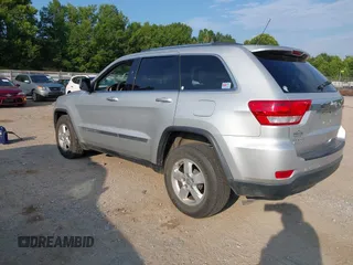 2011 Jeep Grand Cherokee Laredo with VIN 1J4RR4GG2BC514497, listed as a IAAI auction lot 42688206 with 88,822 mi miles and . Bid and sale history available at DreamBid. Image 3.