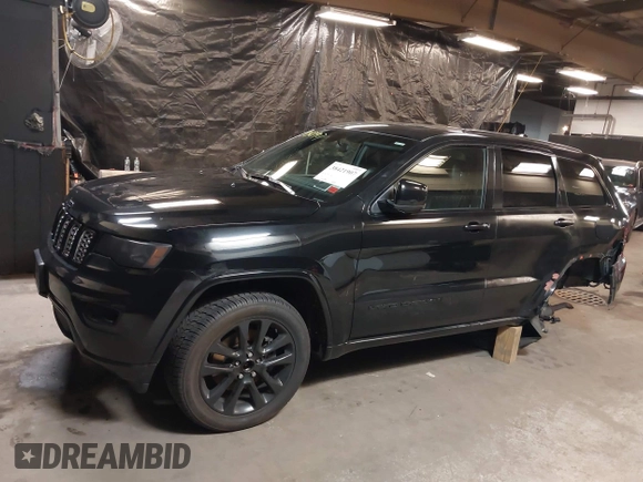 2021 Jeep Grand Cherokee Laredo X with VIN 1C4RJFAG3MC647726, listed as a IAAI auction lot 38421907 with 56,514 mi miles and . Bid and sale history available at DreamBid. Image 14.