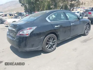 2014 Nissan Maxima S with VIN 1N4AA5AP8EC469519, listed as a IAAI auction lot 42180940 with 119,966 mi miles and . Bid and sale history available at DreamBid. Image 4.
