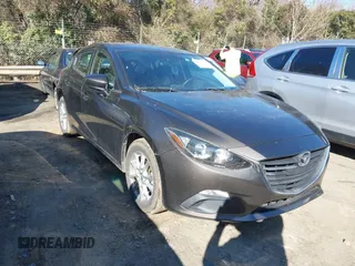 2014 Mazda 3 i Touring with VIN JM1BM1L70E1109815, listed as a IAAI auction lot 41611536 with 98,860 mi miles and . Bid and sale history available at DreamBid. Image 1.