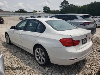 2015 BMW 3 Series 320i with VIN WBA3B1G51FNT64807, listed as a Copart auction lot 58673635 with 95,840 mi miles and Salvage title. Bid and sale history available at DreamBid. Image 2.