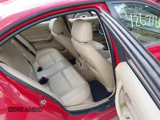 2007 BMW 3 Series 328xi with VIN WBAVC93547KX60002, listed as a IAAI auction lot 42671666 with 162,321 mi miles and . Bid and sale history available at DreamBid. Image 8.