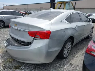 2016 Chevrolet Impala LT with VIN 2G1115S36G9117628, listed as a IAAI auction lot 41260452 with 135,105 mi miles. Bid and sale history available at carsss.com. Image 4.