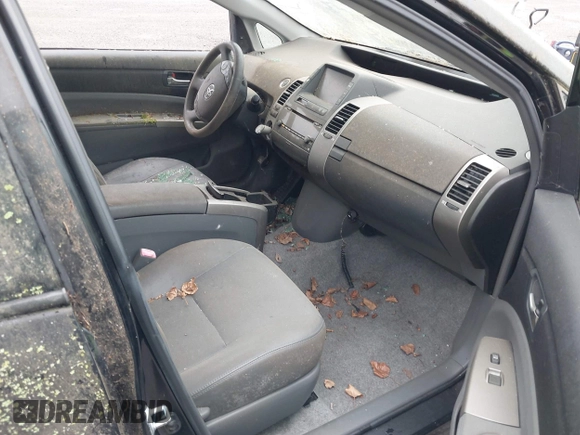 2008 Toyota Prius z VIN JTDKB20U187780823, wystawiony jako IAAI lot #42288104 z przebiegiem Nie podano mil oraz . Historia ofert i sprzedaży dostępna na DreamBid. Obrazek 5.
