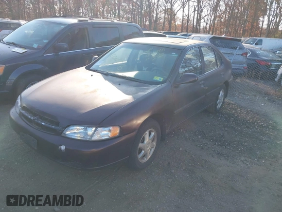 1999 Nissan Altima XE with VIN 1N4DL01D1XC193705, listed as a IAAI auction lot 40880059 with 183,605 mi miles. Bid and sale history available at carsss.com. Image 2.