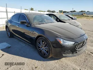 2018 Maserati Ghibli with VIN ZAM57XSA4J1268685, listed as a Copart auction lot 62302313 with 76,576 mi miles. Bid and sale history available at carsss.com. Image 4.