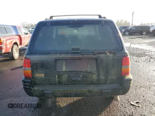 1998 Jeep Grand Cherokee Limited with VIN 1J4GZ78S0WC138917, listed as a Copart auction lot 86223974 with 152,482 mi miles and Clean Title. Bid and sale history available at carsss.com. Image 6.
