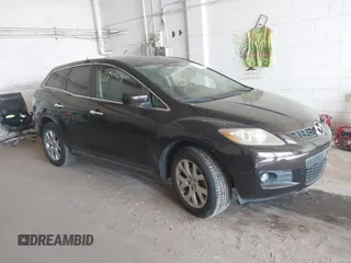 2007 Mazda CX-7 Sport z VIN JM3ER293270115933, wystawiony jako IAAI lot #42200664 z przebiegiem 121 024 mil mil oraz . Historia ofert i sprzedaży dostępna na DreamBid. Obrazek 1.