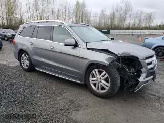 2015 Mercedes-Benz GL-Class GL 450 with VIN 4JGDF6EE3FA520036, listed as a Copart auction lot 51633165 with 105,019 mi miles and Salvage Title. Bid and sale history available at carsss.com. Image 4.