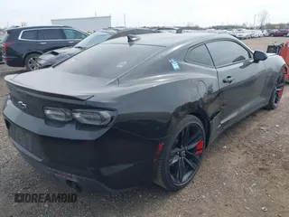2023 Chevrolet Camaro 2LT z VIN 1G1FD1RX6P0133885, wystawiony jako IAAI lot #41990345 z przebiegiem 50 583 mil mil oraz . Historia ofert i sprzedaży dostępna na DreamBid. Obrazek 4.