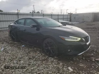 2020 Nissan Maxima SR z VIN 1N4AA6EV4LC369882, wystawiony jako Copart lot #60254215 z przebiegiem 76 992 mil mil oraz Szkoda całkowita • Salvage title. Historia ofert i sprzedaży dostępna na DreamBid. Obrazek 4.