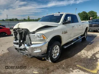 2018 Ram 2500 Laramie z VIN 3C6UR5NL3JG193627, wystawiony jako Copart lot #63457675 z przebiegiem 124 569 mil mil oraz Szkoda całkowita • Salvage title. Historia ofert i sprzedaży dostępna na DreamBid. Obrazek 1.