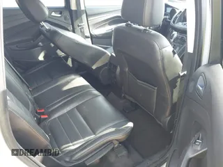 2015 Ford Escape Titanium z VIN 1FMCU9J99FUC75852, wystawiony jako IAAI lot #42171467 z przebiegiem 113 322 mil mil oraz . Historia ofert i sprzedaży dostępna na DreamBid. Obrazek 8.