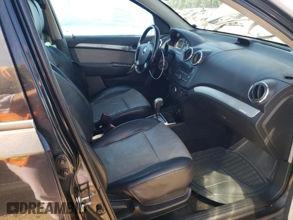 2009 Chevrolet Aveo 2LT with VIN KL1TG66E29B347370, listed as a Copart auction lot 72695624 with 129,479 mi miles and Salvage title. Bid and sale history available at DreamBid. Image 7.