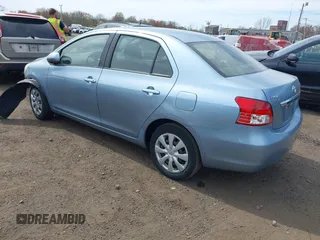 2009 Toyota Yaris with VIN JTDBT903891336792, listed as a IAAI auction lot 42096543 with 115,735 mi miles and . Bid and sale history available at DreamBid. Image 3.