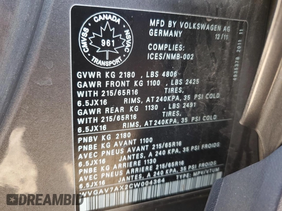 2012 Volkswagen Tiguan SE z VIN WVGAV7AX2CW004364, wystawiony jako Copart lot #55408655 z przebiegiem 271 198 mil mil oraz Szkoda całkowita • Salvage title. Historia ofert i sprzedaży dostępna na DreamBid. Obrazek 13.