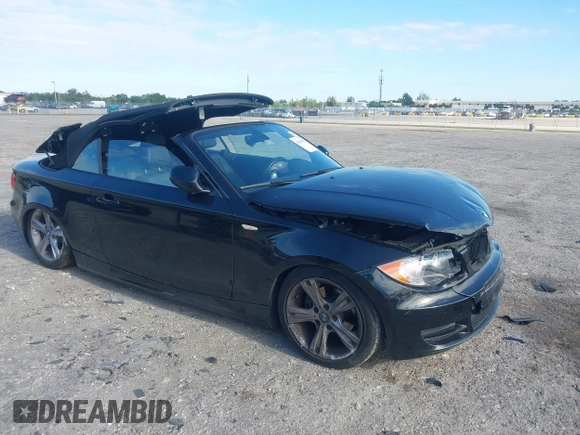 2011 BMW 1 Series 128i with VIN WBAUL7C54BVM80474, listed as a IAAI auction lot 42031032 with 76,617 mi miles and . Bid and sale history available at carsss.com. Image 1.