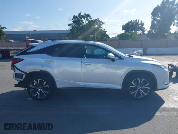 2021 Lexus RX 450h with VIN 2T2HGMDA2MC071281, listed as a IAAI auction lot 42587770 with 88,009 mi miles and . Bid and sale history available at DreamBid. Image 13.
