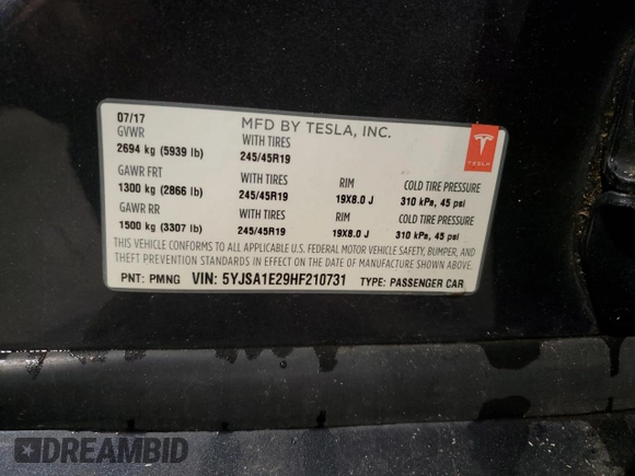 2017 Tesla Model S 100D with VIN 5YJSA1E29HF210731, listed as a Copart auction lot 56762565 with 114,117 mi miles and Salvage title. Bid and sale history available at DreamBid. Image 12.