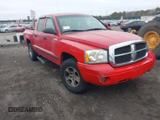 2007 Dodge Dakota SLT z VIN 1D7HW48N77S128359, wystawiony jako IAAI lot #41735315 z przebiegiem Nie podano mil oraz . Historia ofert i sprzedaży dostępna na DreamBid. Obrazek 1.