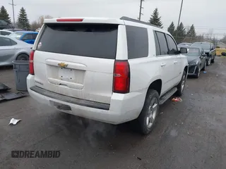 2016 Chevrolet Tahoe LT with VIN 1GNSKBKC6GR462856, listed as a IAAI auction lot 41687980 with 113,161 mi miles and . Bid and sale history available at DreamBid. Image 4.