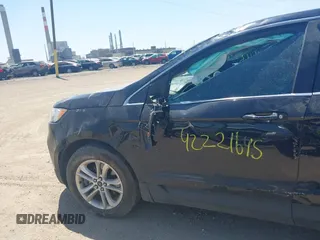 2019 Ford Edge SEL with VIN 2FMPK4J9XKBB03842, listed as a IAAI auction lot 42221645 with 155,424 mi miles and . Bid and sale history available at DreamBid. Image 14.
