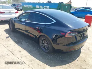 2018 Tesla Model 3 Long Range Battery with VIN 5YJ3E1EB1JF122786, listed as a IAAI auction lot 42010451 with 85,510 mi miles and . Bid and sale history available at DreamBid. Image 3.
