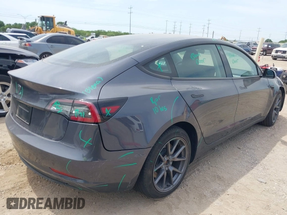 2023 Tesla Model 3 with VIN 5YJ3E1EA5PF565071, listed as a IAAI auction lot 42232719 with 15,389 mi miles and . Bid and sale history available at DreamBid. Image 4.