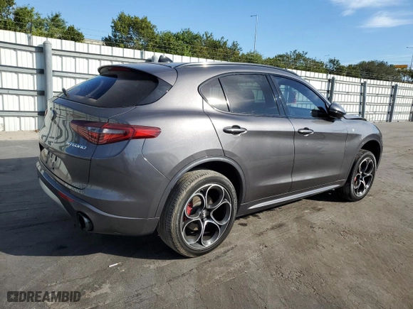 2023 Alfa Romeo Stelvio Ti with VIN ZASPAKBN1P7D54408, listed as a Copart auction lot 83367044 with 12,330 mi miles and Salvage Title. Bid and sale history available at carsss.com. Image 3.