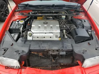 2002 Cadillac Eldorado z VIN 1G6EC129X2B106142, wystawiony jako Copart lot #74424164 z przebiegiem Nie podano mil oraz Szkody całkowita. Historia ofert i sprzedaży dostępna na DreamBid. Obrazek 11.