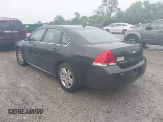 2014 Chevrolet Impala LT z VIN 2G1WB5E35E1128453, wystawiony jako IAAI lot #42388474 z przebiegiem 99 665 mil mil oraz . Historia ofert i sprzedaży dostępna na DreamBid. Obrazek 3.