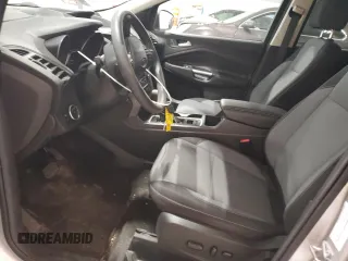 2017 Ford Escape SE z VIN 1FMCU9G90HUA69507, wystawiony jako Copart lot #56594435 z przebiegiem 102 261 mil mil oraz Szkoda całkowita • Salvage title. Historia ofert i sprzedaży dostępna na DreamBid. Obrazek 7.